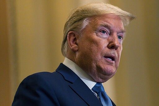 President Donald Trump talks to reporters about coronavirus after meeting with Republican lawmakers on Capitol Hill, Tuesday, March 10, 2020, in Washington. (AP Photo/Evan Vucci)