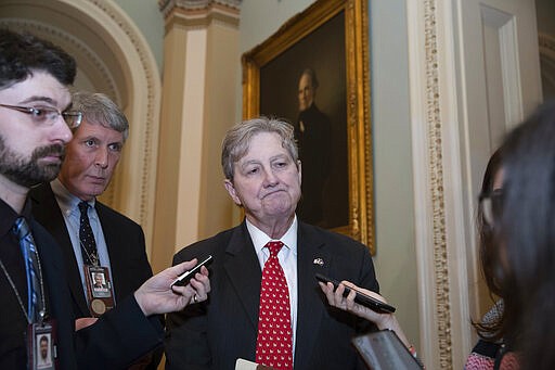 Sen. John Kennedy, R-La., speaks with reporters on Capitol Hill, Tuesday, Feb. 4, 2020 in Washington. (AP Photo/Alex Brandon)