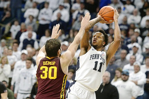 FILE - In this Feb. 8, 2020, file photo, Penn State's Lamar Stevens (11) scores on Minnesota's Alihan Demir (30) in late second-half action of an NCAA college basketball game in State College, Pa. Stevens was selected to the Associated Press All-Big Ten team selected Tuesday, March 10, 2020.(AP Photo/Gary M. Baranec, File)