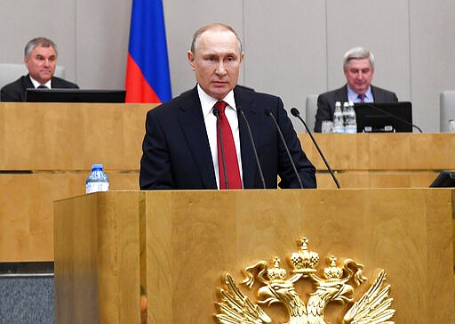 Russian President Vladimir Putin speaks during a session prior to voting for constitutional amendments at the State Duma, the Lower House of the Russian Parliament in Moscow, Russia, Tuesday, March 10, 2020. Putin says he supports a proposed constitutional amendment that would allow him to seek another term and remain in power. Putin gave his support Tuesday to the amendment put forward by a lawmaker who as a Soviet cosmonaut became the first woman to fly to space.(Alexei Nikolsky, Sputnik, Kremlin Pool Photo via AP)