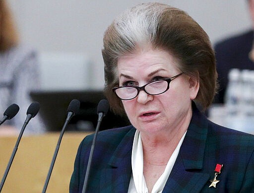 In this handout photo provided by The State Duma, The Federal Assembly of The Russian Federation, the world's first woman cosmonaut Valentina Tereshkova speaks during a session prior to voting for constitutional amendments at the State Duma, the Lower House of the Russian Parliament in Moscow, Russia, Tuesday, March 10, 2020. Tereshkova, the first woman to have flown in space and a lawmaker with Russia's ruling party, proposed Tuesday to scrap presidential term limits in order to allow Russia President Vladimir Putin to run for re-election in 2024. (The State Duma, The Federal Assembly of The Russian Federation via AP)