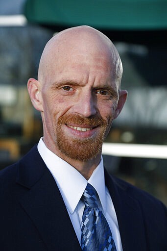 This is a Saturday, March 7, 2020 photograph of Brian Flowers, taken in Clinton, Miss. Flowers, a military veteran who works at Grand Gulf Nuclear Station, faces two opponents in the Republican primary for Mississippi's Second Congressional District seat. (AP Photo/Rogelio V. Solis)