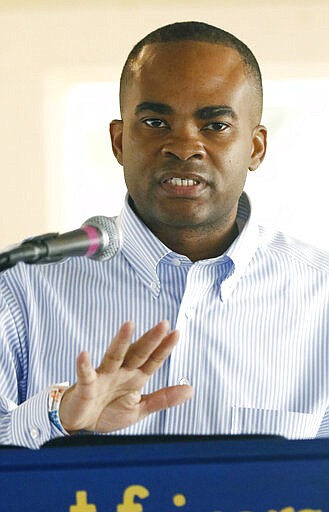 FILE - In this Aug. 1, 2018 file photo, Tobey Bernard Bartee, a Democrat and candidate for the party's nomination for the U.S. Senate, speaks before an audience at the Neshoba County Fair in Philadelphia, Miss. Bartee, a former military intelligence officer, again faces Mike Espy, a fellow Democrat who is a former congressman and was President Bill Clinton's first agriculture secretary and another candidate in the primary, Tuesday, March 10. (AP Photo/Rogelio V. Solis, File)