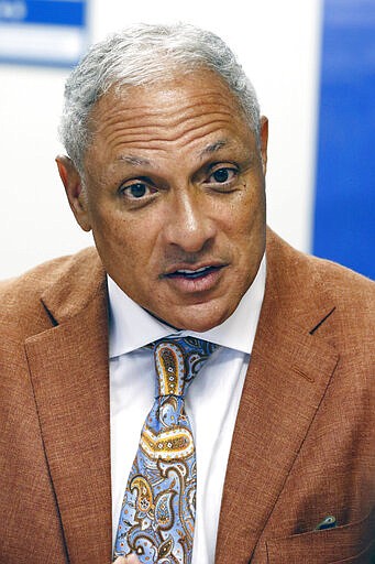 File - In this Oct. 5, 2018, file photo, Mike Espy, a former congressman and former U.S. agriculture secretary, is photographed in Jackson, Miss., and the Democrat will again try to beat incumbent Republican U.S. Sen. Cindy Hyde-Smith, after losing a competitive race to her in the 2018 special election. However, he must first beat two opponents in his party's primary on Tuesday, March 10. (AP Photo/Rogelio V. Solis, File)