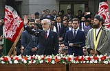 US starts troop pullout, seeks end to Afghan leaders' feud
