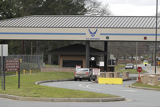 Dobbins Air Reserve Base is shown Monday, March 9, 2020, in Marietta, Ga. Thirty-four Georgians are among the U.S. citizens expected to arrive at the base on either Monday night or Tuesday morning, Georgia Gov. Brian Kemp said in a news release.(AP Photo/John Bazemore)