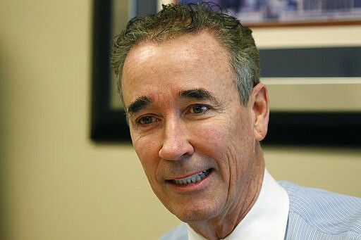 In this Thursday, March 5, 2020 photo, Virginia State Sen. Joe Morrissey, D-Richmond, speaks during an interview in his office at the Capitol in Richmond, Va. The former prosecutor-turned-defense attorney, who calls himself &quot;Fighting Joe,&quot; has pushed his way back into the political fold. (AP Photo/Steve Helber)