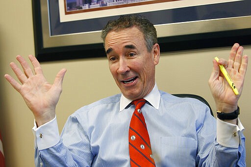 In this Thursday, March 5, 2020 photo, Virginia State Sen. Joe Morrissey, D-Richmond, gestures during an interview in his office at the Capitol in Richmond, Va. The former prosecutor-turned-defense attorney, who calls himself &quot;Fighting Joe,&quot; has pushed his way back into the political fold. (AP Photo/Steve Helber)