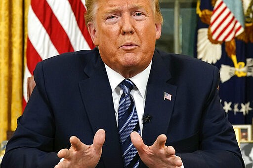 President Donald Trump speaks in an address to the nation from the Oval Office at the White House about the coronavirus Wednesday, March, 11, 2020, in Washington. (Doug Mills/The New York Times via AP, Pool)