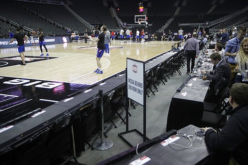 Media is restricted from court side as Kansas practices for the Big 12 men's basketball tournament in Kansas City, Kan., Wednesday, March 11, 2020. (AP Photo/Orlin Wagner)