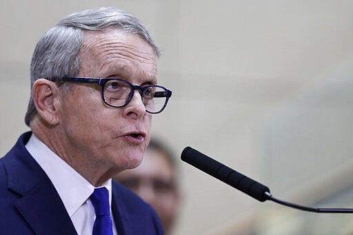 Ohio Governor Mike DeWine gives an update at MetroHealth Medical Center on the state's preparedness and education efforts to limit the potential spread of a new virus which caused a disease called COVID-19, Thursday, Feb. 27, 2020, in Cleveland. (AP Photo/Tony Dejak)