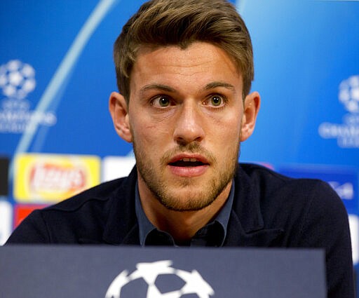 FILE - In this April 9, 2019, file photo, Juventus' Daniele Rugani answers questions during a press conference at the Johan Cruyff ArenA in Amsterdam, Netherlands. Italian soccer club Juventus announced on Wednesday, March 11, 2020, that defender Daniele Rugani has tested positive for new coronavirus. Rugani, who is also an Italy international, is the first player in Italy&#146;s top soccer division to test positive but Juventus stressed that the 25-year-old has no symptoms.  (AP Photo/Peter Dejong, File)