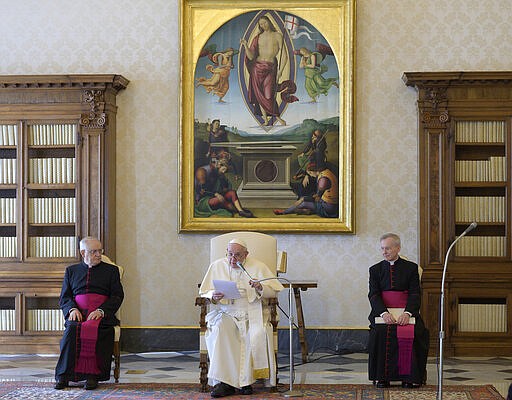 Pope Francis holds his general audience at the Vatican, Wednesday, March 11, 2020.  Pope Francis held his weekly general audience in the privacy of his library as the Vatican implemented Italy&#146;s drastic coronavirus lockdown measures, barring the general public from St. Peter&#146;s Square and taking precautions to limit the spread of infections in the tiny city state. For most people, the new coronavirus causes only mild or moderate symptoms, such as fever and cough. For some, especially older adults and people with existing health problems, it can cause more severe illness, including pneumonia. (Vatican News via AP)