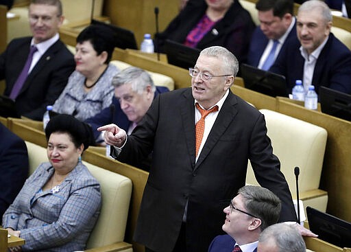 Russian Liberal Democratic Party leader Vladimir Zhirinovsky gestures while speaking during a session prior to vote on a third reading of constitutional amendments at the State Duma, the Lower House of the Russian Parliament in Moscow, Russia, Wednesday, March 11, 2020. The Russian parliament has approved a sweeping constitutional reform that will allow President Vladimir Putin to stay in power for another 12 years after his current term ends in 2024. Wednesday's vote was the third and final reading. (AP Photo/Pavel Golovkin)