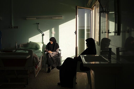 Family members of children having heart surgery wait in a room at the Tajoura National Heart Center in Tripoli, Libya, on Feb. 27, 2020. (AP Photo/Felipe Dana)