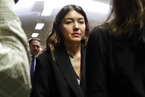 Miriam Haley arrives at court for Harvey Weinstein's sentencing, in New York, Wednesday, March 11, 2020.  Weinstein faces a minimum of 5 years and a maximum of 29 years in prison for raping an aspiring actress in 2013 and forcibly performing oral sex on a TV and film production assistant in 2006. A second criminal case is pending in California. (AP Photo/Richard Drew)