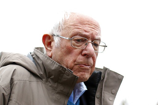 Democratic presidential candidate Sen. Bernie Sanders, I-Vt., visits outside a polling location at Warren E. Bow Elementary School in Detroit, Tuesday, March 10, 2020. (AP Photo/Paul Sancya)
