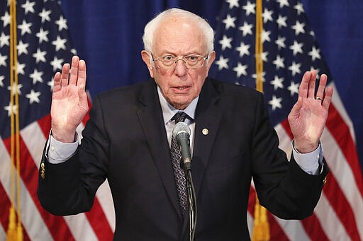 Democratic presidential candidate, Sen. Bernie Sanders, I-Vt., speaks to reporters on Wednesday, March 11, 2020, in Burlington, Vt. (AP Photo/Charles Krupa)