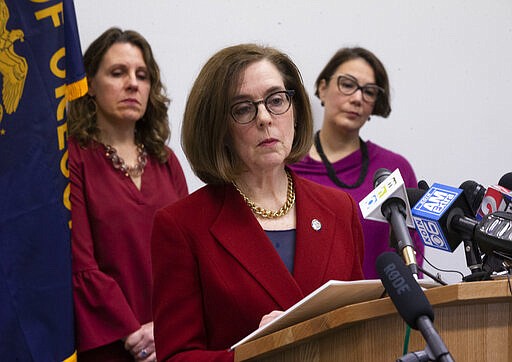 Oregon Governor Kate Brown speaks during a press conference with state and local government officials Thursday, March 12, 2020 in Portland to talk about coronavirus plans and protocols in the state. (Beth Nakamura/The Oregonian via AP)