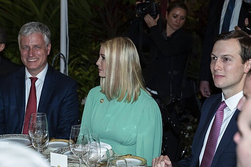 National Security Adviser Robert O'Brien, left, Ivanka Trump, the daughter and assistant to President Donald Trump, and White House Senior Adviser Jared Kushner are seated before a dinner with President Donald Trump and Brazilian President Jair Bolsonaro, at Mar-a-Lago, Saturday, March 7, 2020, in Palm Beach, Fla. (AP Photo/Alex Brandon)