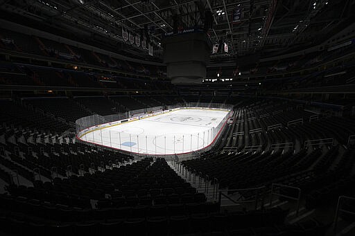 The Capital One Arena, home of the Washington Capitals NHL hockey club, sits empty Thursday, March 12, 2020, in Washington. The NHL is following the NBA&#146;s lead and suspending its season amid the coronavirus outbreak, the league announced Thursday. (AP Photo/Nick Wass)