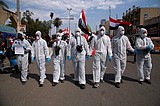 The new mask: Wave of global revolt replaced by virus fear