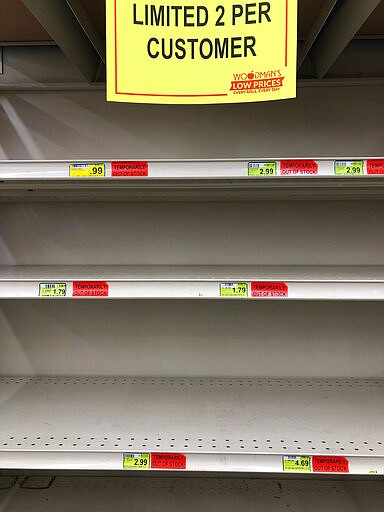 A section of shelves is empty at Woodman's Markets in Kenosha, Wis., Thursday, March 12, 2020. Hand sanitizers, hand soaps and antibacterial wipes are in short supply as shoppers stock up amid the new coronavirus. (AP Photo/Nam Y. Huh)