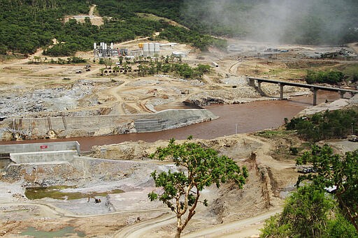 FILE - In this June 28, 2013 file photo, the Blue Nile river flows near the site of the Grand Ethiopian Renaissance Dam near Assosa, Ethopia. In an interview with The Associated Press on Thursday March 12, 2020, Ethiopia's foreign minister said his country is refusing to be pressured by the U.S. into signing a deal with Egypt and Sudan over Ethiopia's controversial dam on the Nile River. (AP Photo/Elias Asmare, File)