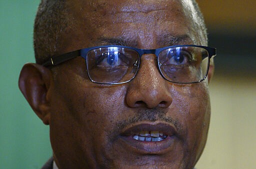 FILE - In this Tuesday Feb. 18, 2020 file photo, Ethiopian Foreign Minister Gedu Andargachew speaks during a press conference with U.S. Secretary of State Mike Pompeo, at the Sheraton Hotel, in Addis Ababa, Ethiopia. In an interview with The Associated Press on Thursday March 12, 2020, Ethiopia's foreign minister said his country is refusing to be pressured by the U.S. into signing a deal with Egypt and Sudan over Ethiopia's controversial dam on the Nile River. (Andrew Caballero-Reynolds/Pool Photo via AP, File)