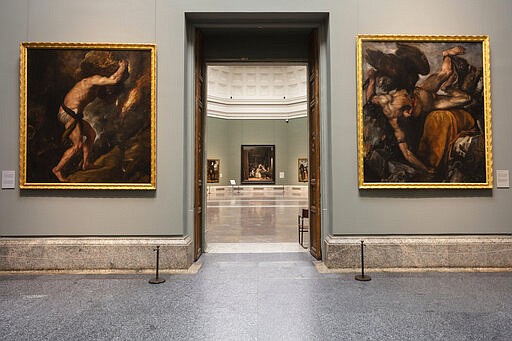 View of empty galleries at El Prado Museum in Madrid, Spain, Thursday, March 12, 2020. The spread of the new coronavirus continues disrupting normal life in parts of Spain, and it's also affecting sports, cultural and all sorts of leisure events after the government imposed a ban on gatherings of more than 1,000 people and to cut to a third the maximum audience of all venues holding indoor sports or cultural events. Exhibitions, conferences, sports centers and museums are closing in Madrid, including the Spanish capital's Prado Museum for the first time in eight decades. The museum, which hosts works by Francisco de Goya and Diego de Velazquez, among other Spanish and European artists, was forced to shut down last during the Spanish Civil War (1936-39). The vast majority of people recover from the new coronavirus. According to the World Health Organization, most people recover in about two to six weeks, depending on the severity of the illness. (AP Photo/Bernat Armangue)