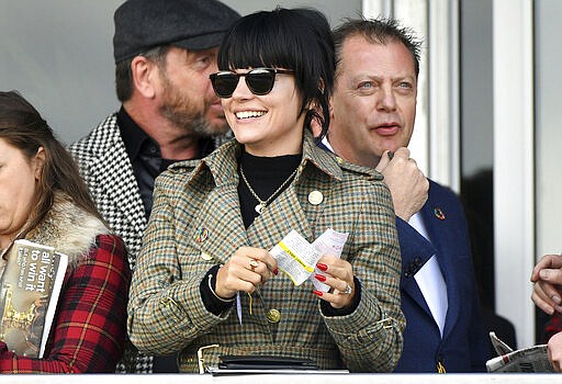 Lily Allen during day four of the Cheltenham Festival at Cheltenham Racecourse in Cheltenham, England, Friday, March 13, 2020. (Jacob King/PA via AP)