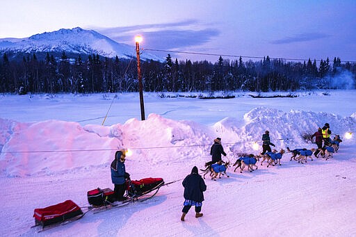 Linwood Fiedler leaves Takotna, Alaska, Thursday, March 12, 2020, during the Iditarod Trail Sled Dog Race. (Loren Holmes/Anchorage Daily News via AP)