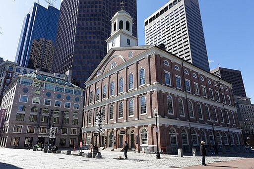 The plaza is empty in front of Faneuil Hall in Boston on Saturday, March, 14, 2020.  Gov. Charlie Baker on Friday issued an emergency order banning most gatherings of more than 250 people to help prevent the spread of COVID-19 coronavirus.  For most people, the new coronavirus causes only mild or moderate symptoms, such as fever and cough. For some, especially older adults and people with existing health problems, it can cause more severe illness, including pneumonia. The vast majority of people recover from the new virus. (AP Photo/Michael Dwyer)