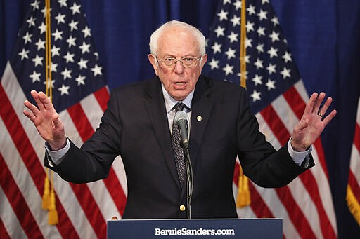 Democratic presidential candidate, Sen. Bernie Sanders, I-Vt., speaks to reporters on Wednesday, March 11, 2020, in Burlington, Vt. (AP Photo/Charles Krupa)