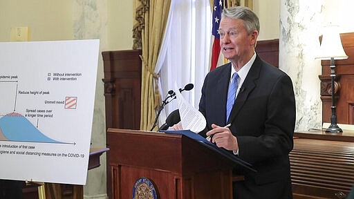 Gov. Brad Little proclaimed a state of emergency in Idaho as a proactive step to prevent the spread of coronavirus COVID-19, Friday, March 13, 2020, at his Statehouse office in Boise, Idaho. (Darin Oswald/Idaho Statesman via AP)