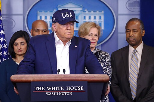 President Donald Trump speaks during a briefing on coronavirus in the Brady press briefing room at the White House, Saturday, March 14, 2020, in Washington. Listening from left are Administrator of the Centers for Medicare and Medicaid Services Seema Verma, U.S. Surgeon General Jerome Adams, Dr. Deborah Birx, White House coronavirus response coordinator, and Housing and Urban Development Secretary Ben Carson. (AP Photo/Alex Brandon)