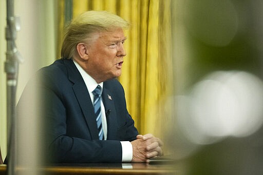 President Donald Trump addresses the nation from the Oval Office at the White House, Wednesday, March 11, 2020, in Washington. (AP Photo/Manuel Balce Ceneta)