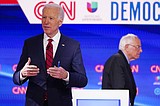 Distance and silence: Biden, Sanders clash without audience