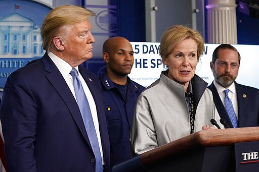 President Donald Trump listens as Dr. Deborah Birx, White House coronavirus response coordinator, speaks during a press briefing with the coronavirus task force, at the White House, Monday, March 16, 2020, in Washington. (AP Photo/Evan Vucci)