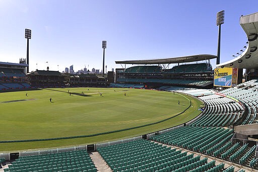 Empty seats ring the field during a One Day International cricket match between Australia and New Zealand at the Sydney Cricket Ground in Sydney, Friday, March 13, 2020. Cricket Australia announced that three one-day international matches between Australia and New Zealand would be played in empty stadiums because of concerns over the coronavirus pandemic. The first of the three matches began at the 48,000-seat Sydney Cricket Ground, where television announcers spoke of the &quot;eerie&quot; silence in the stadium devoid of fans. (Dean Lewins/AAP Image via AP)