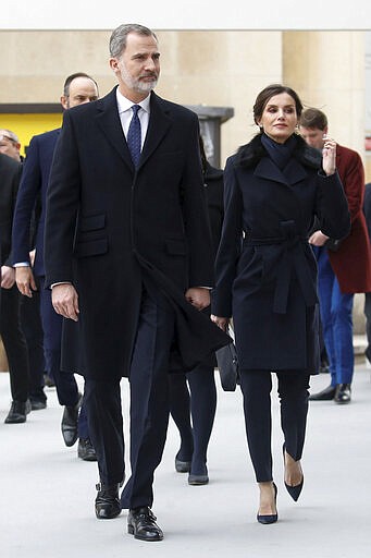 Spain's King Felipe VI and Queen Letizia, arrive to a ceremony to honour victims of terror attacks in Europe, on the 16th anniversary of Madrid attacks, at the Trocadero in Paris, Wednesday March 11, 2020. French President Emmanuel Macron and King of Spain Felipe VI are paying homage to victims of terrorism in a special ceremony prompted by attacks that hit both their countries and changed Europe's security posture.(Gonzalo Fuentes/Pool via AP)