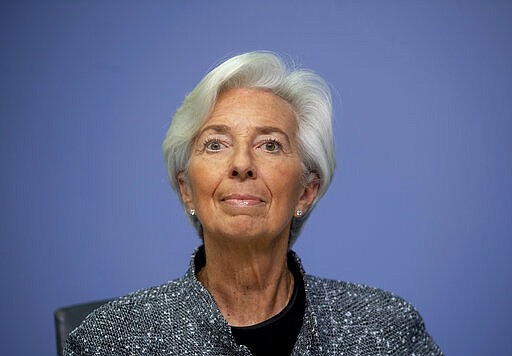 President of European Central Bank Christine Lagarde looks up prior to a press conference following a meeting of the ECB governing council in Frankfurt, Germany, Thursday, March 12, 2020. (AP Photo/Michael Probst)