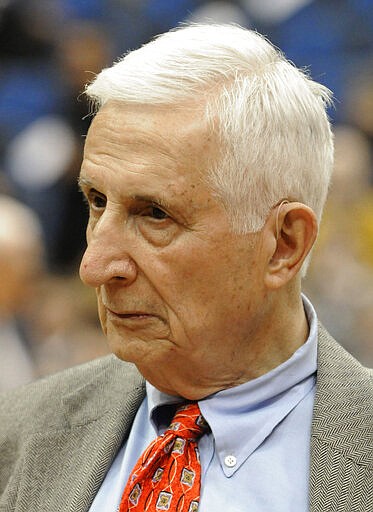 FILE - In this March 1, 2011, file photo, longtime Star Tribune of Minneapolis sports reporter and radio personality Sid Hartman, who turned 100 on Sunday, March 15, 2020, looks on prior to an NBA basketball game in Minneapolis. Hartman served as the acting general manager of the Minneapolis Lakers who later became the Los Angeles Lakers. (AP Photo/Jim Mone, File)