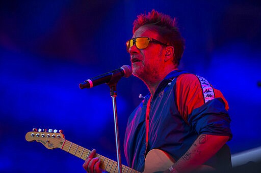 Argentina's Vicentico performs during the Vive Latino music festival in Mexico City, Saturday, March 14, 2020. The two-day rock festival is one of the most important and longest running of Mexico. (AP Photo/Christian Palma)