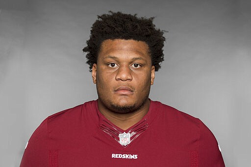 FILE - This is a 2019 file photo showing Ereck Flowers of the Washington Redskins NFL football team. Offensive lineman Ereck Flowers has agreed to terms on a $30 million, three-year contract with the Miami Dolphins, Monday, March 16, 2020. The deal was confirmed by Flowers&#146; agent, Drew Rosenhaus, who said $19.95 million is guaranteed.(AP Photo/File)