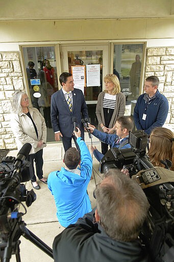 Knox County Board of Elections Chair Kim Horn, left, Ohio Secretary of State Frank LaRose, Ohio Eastern Star Home CEO Michele Engelbach and Elections Deputy Scott Howard answer questions during a press conference Thursday, March 12, 2020. LaRose praised local election boards for moving a polling location quickly as coronavirus cases increased in Ohio. (Joshua Morrison/Mount Vernon News via AP)