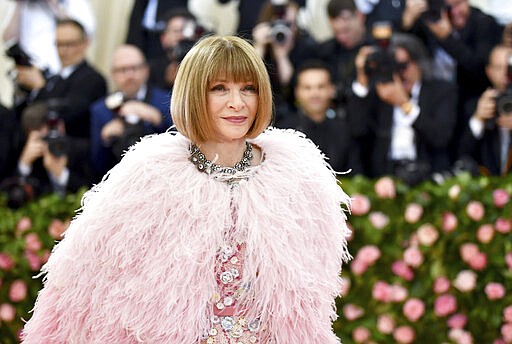 FILE - In this May 6, 2019 file photo, Vogue editor Anna Wintour attends The Metropolitan Museum of Art's Costume Institute benefit gala celebrating the opening of the &quot;Camp: Notes on Fashion&quot; exhibition in New York. The Met Gala, has been postponed due to the coronavirus outbreak. Wintour, the annual event host, dropped the news into the bottom of a post she wrote on Vogue.com endorsing Joe Biden for president. (Photo by Charles Sykes/Invision/AP, File)