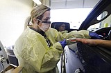 Indiana sees 1st coronavirus death as restrictions added