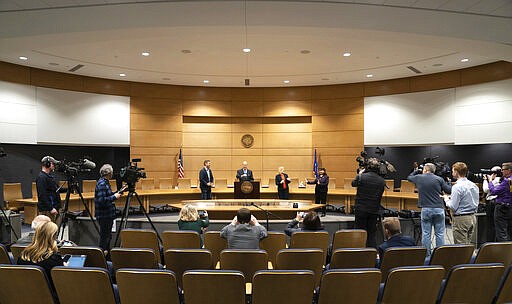 Legislative leaders kept the appropriate social distancing while laying out the plans for operations in response to coronavirus and COVID-19 concerns Monday, March 16, 2020 in St. Paul.From left are House Minority Leader Kurt Daudt, R-Crown, Senate Majority Leader Paul Gazelka, R-Baxter, House Speaker Melissa Hortman, DFL-Brooklyn Park and Senate Minority Leader Susan Kent, DFL-Woodbury.  (Glen Stubbe/Star Tribune via AP)