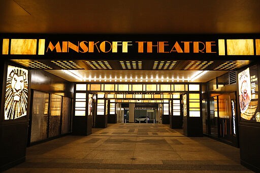 The Minskoff Theatre is shuttered Thursday, March 12, 2020, in New York, near Times Square after Broadway theaters closed following New York Gov. Andrew Cuomo's banning of gatherings of more than 500 people over concerns about the spread of the coronavirus. (AP Photo/Kathy Willens)